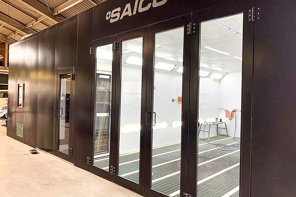 Black STJ spray booth with glass doors