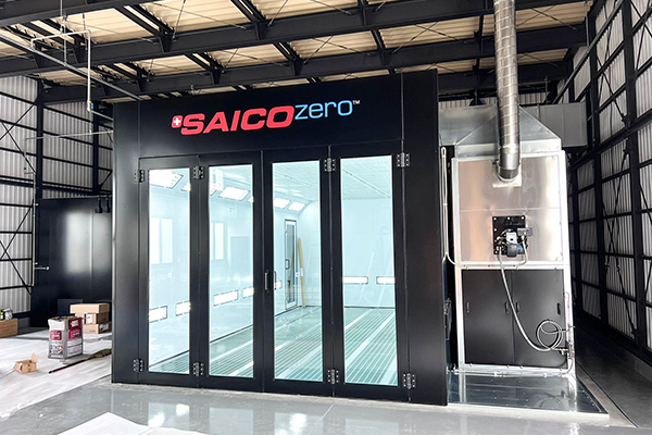 Black STJ spray booth with its burner outside
